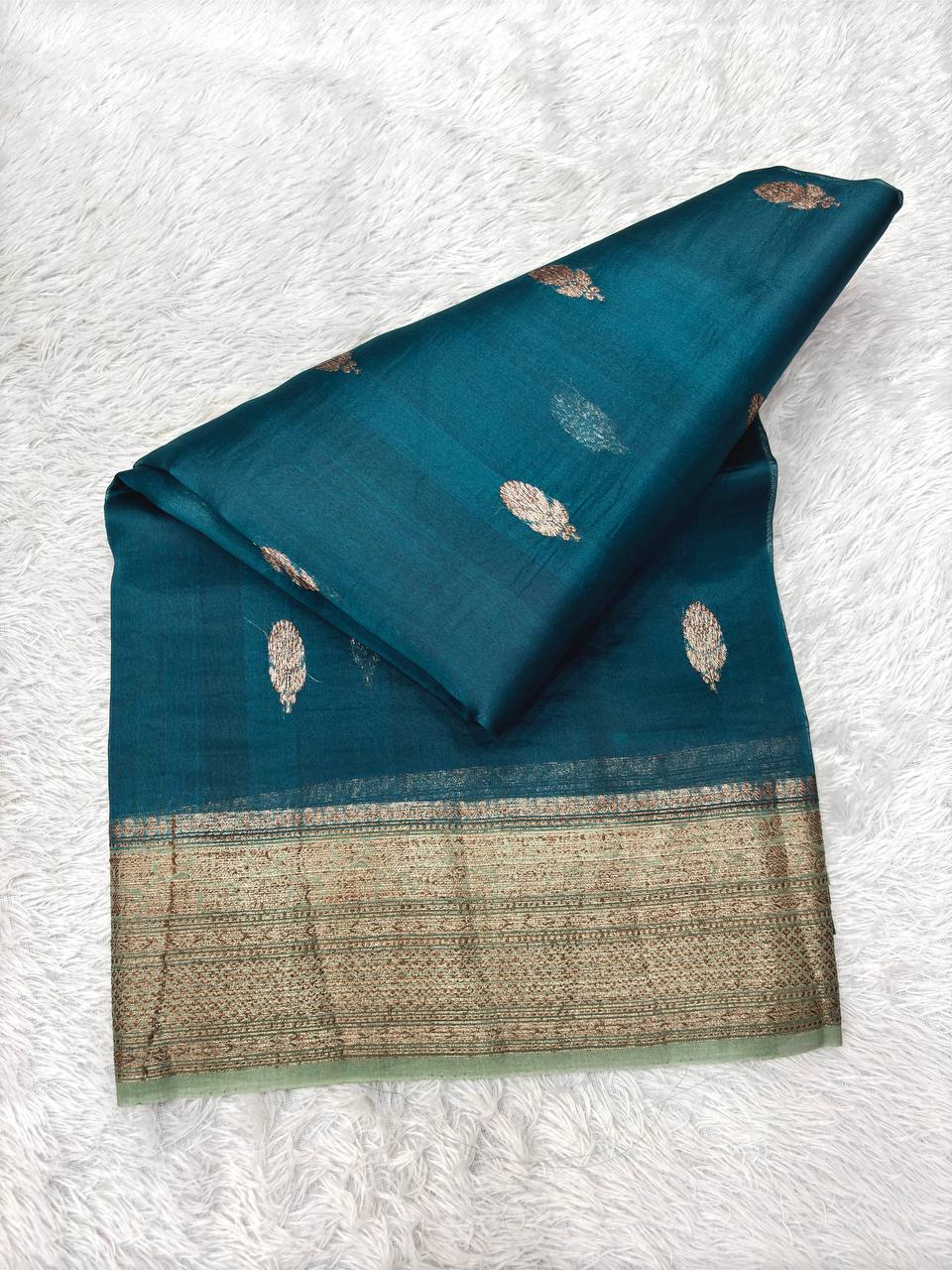 Deep Teal Blue Khaddi Georgette Kora Silk Saree | Antique Bronze Kadhua Booti & Contrast Sage Green Border
