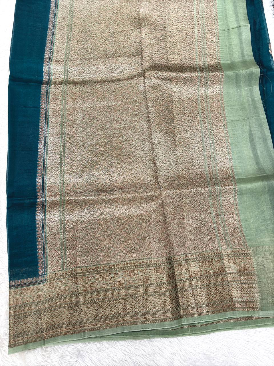 Deep Teal Blue Khaddi Georgette Kora Silk Saree | Antique Bronze Kadhua Booti & Contrast Sage Green Border
