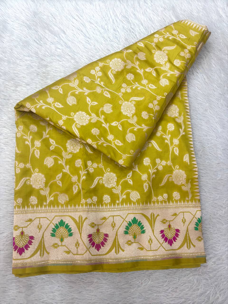 Luminous Olive Chartreuse Katan Silk Banarasi Saree | Fine Cutwork Silver Jangal Floral Vines & Contrast Cream Ivory Border with Meenakari Trees