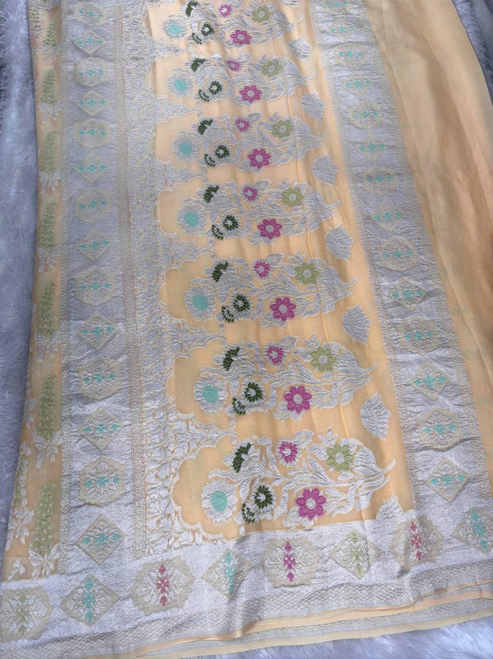 Peach Cream Khaddi Georgette Banarasi Saree with Multi-Color Meenakari Floral Sprigs & Silver Zari