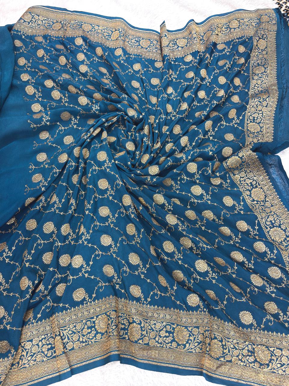Teal Blue Khaddi Crepe Georgette Saree with Embossed Diamond Jaal and Architectural Paisley Pallu