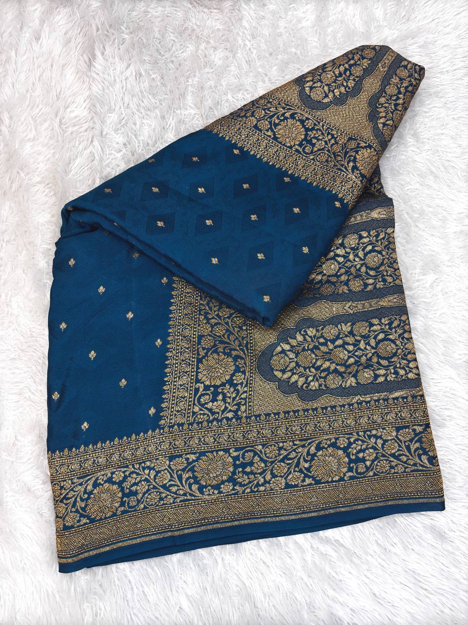 Teal Blue Khaddi Crepe Georgette Saree with Embossed Diamond Jaal and Architectural Paisley Pallu