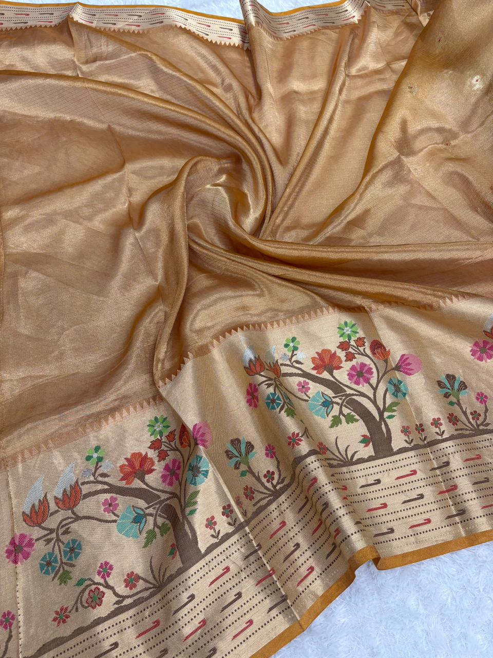 Luxurious Peacock Blue Banarasi Tissue Saree with Antique Zari Butta