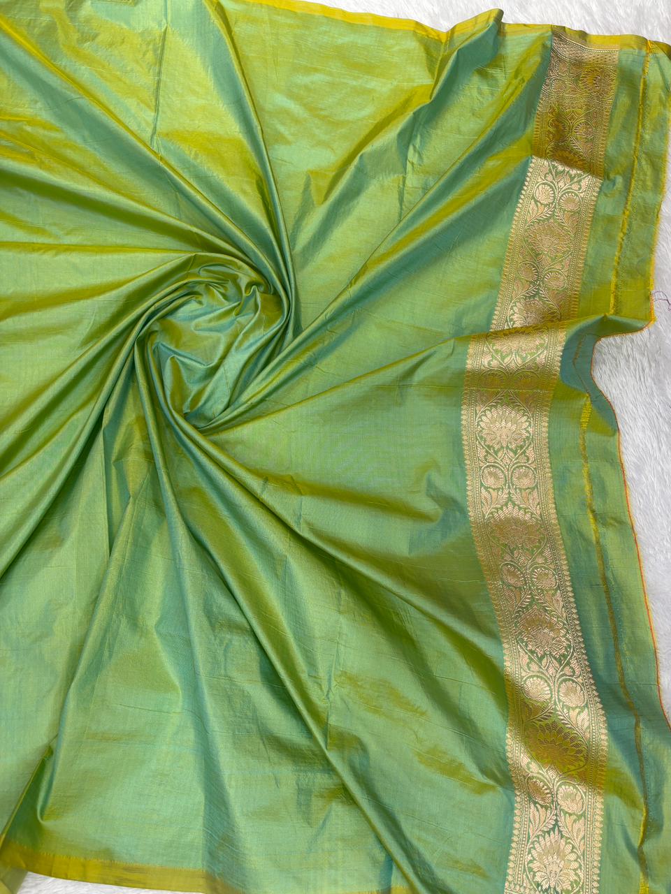 Refreshing Parrot Green Pure Katan Silk Banarasi Handloom Saree with Silver Zari Jungla & Meenakari