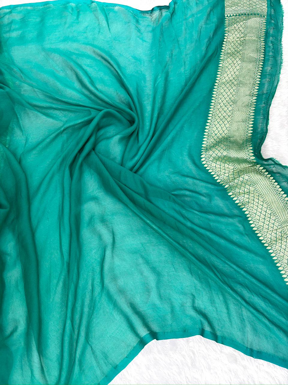 Refreshing Teal Blue Khaddi Georgette Handloom Saree with Multi-Color Geometric Jaal