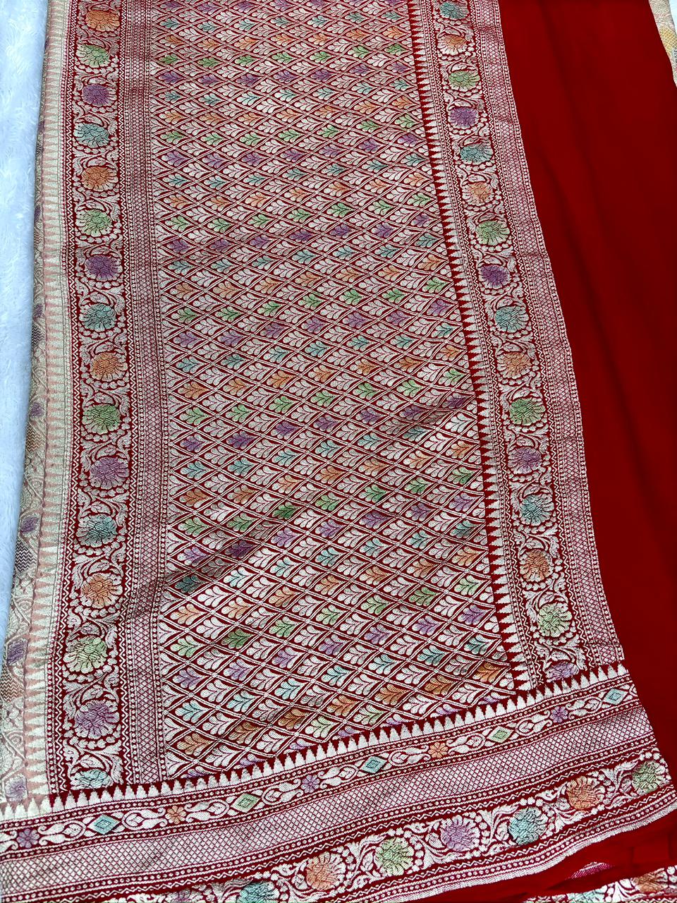 Artistic Rust Red Khaddi Georgette Handloom Saree with Multi-Color Geometric Mosaic Jaal