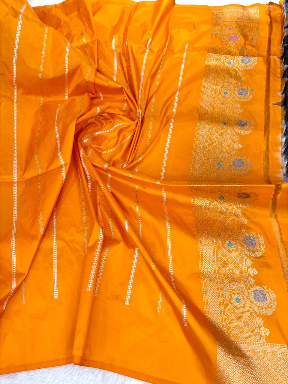 Radiant Amber Handloom Silk Saree with Antique Zari Guldasta Butti and Vibrant Meenakari Border