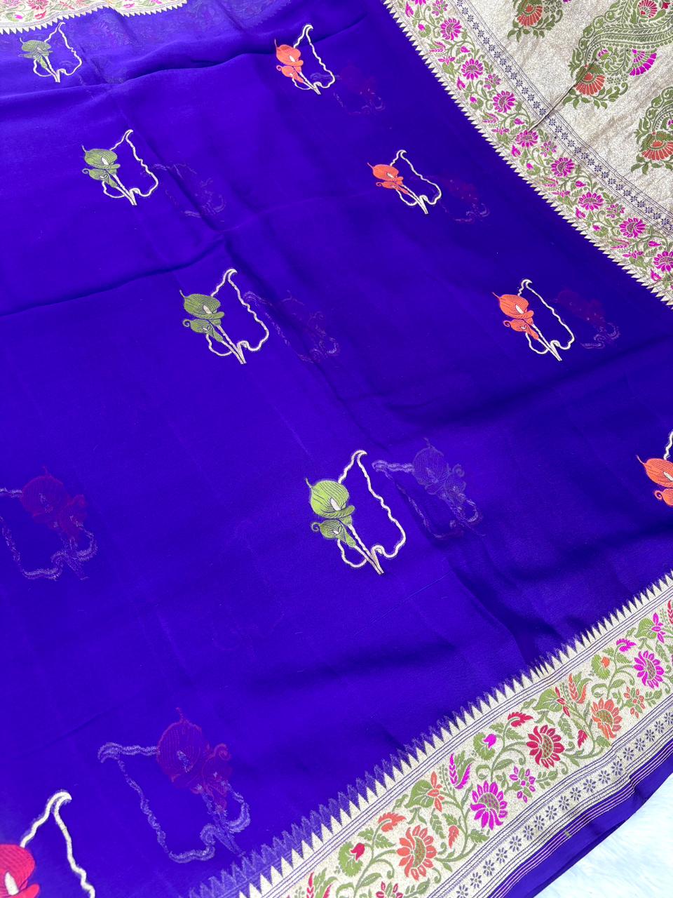 Enchanting Violet Pure Khaddi Georgette Handloom Banarasi Saree with Stylized Floral Motifs