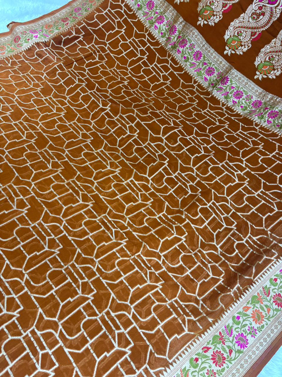 Rust Copper Pure Khaddi Georgette Saree with Abstract Geometric Zari Weave