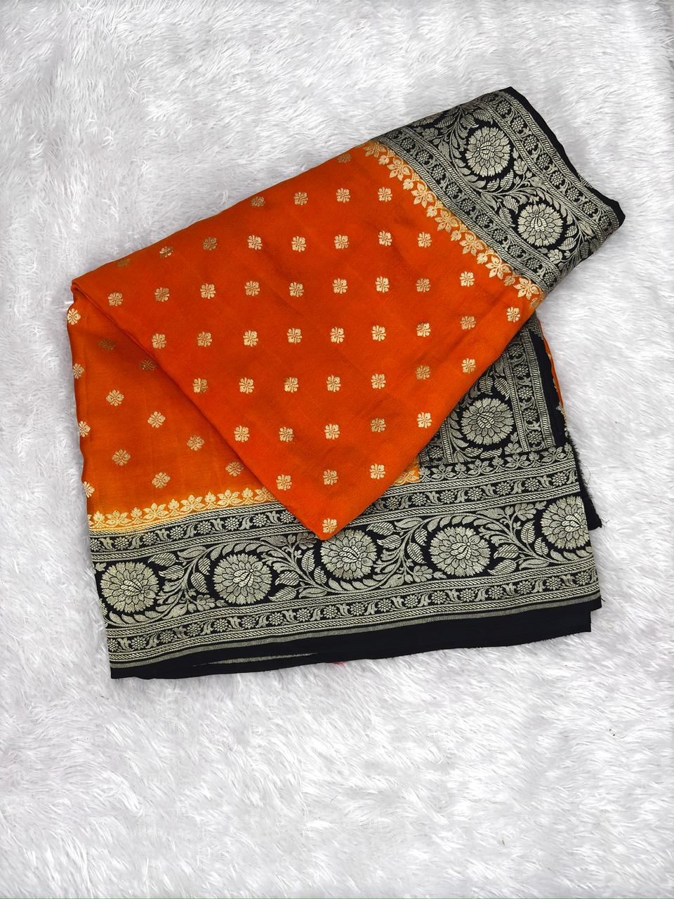 Vibrant Tangerine & Midnight Black Handloom Banarasi Crepe Georgette Saree with Silver Zari Buti & Scalloped Pallu