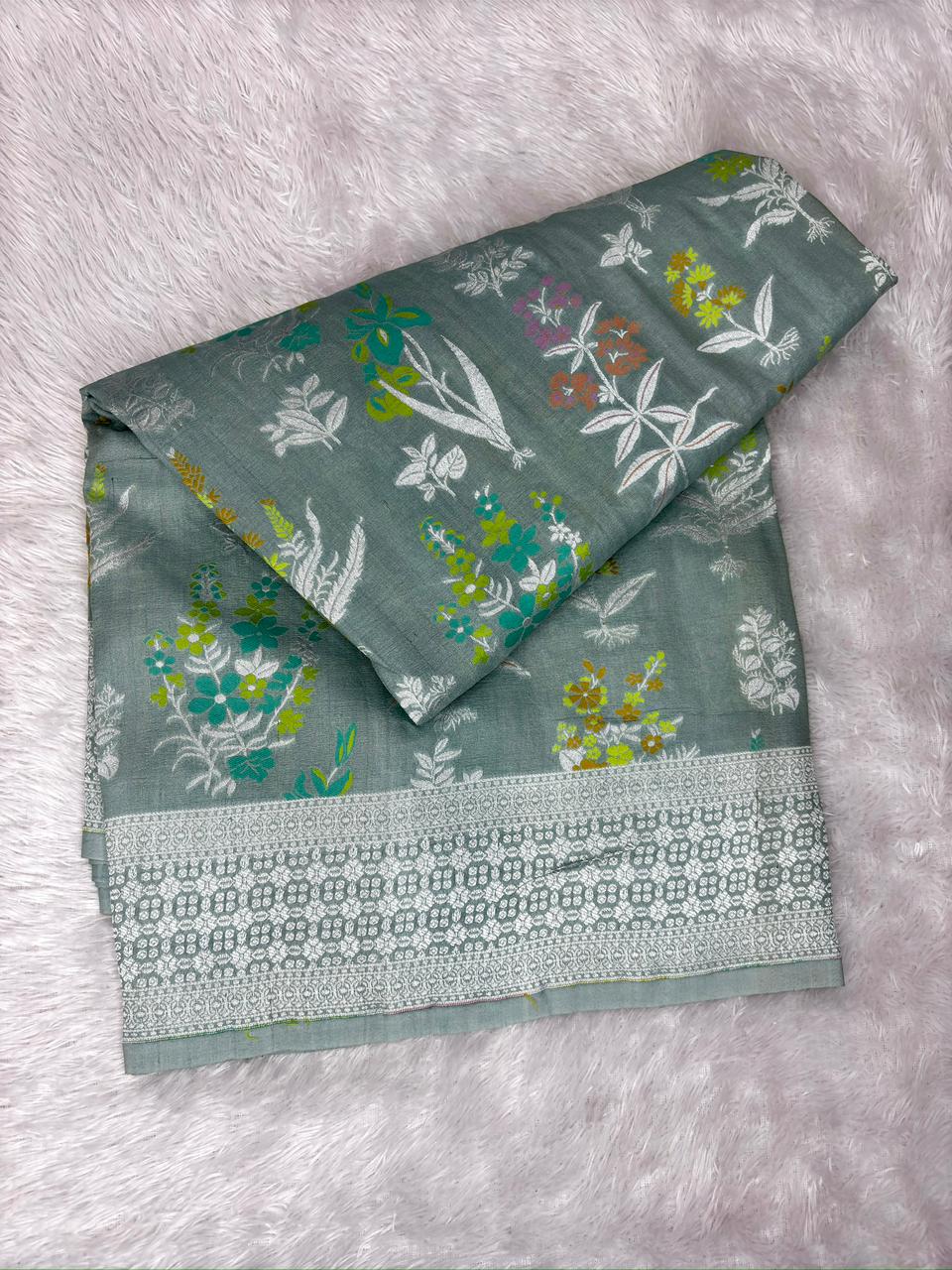 Sage Green Tussar Georgette Handloom Saree with Multicolour Floral Buti & Silver Zari Border