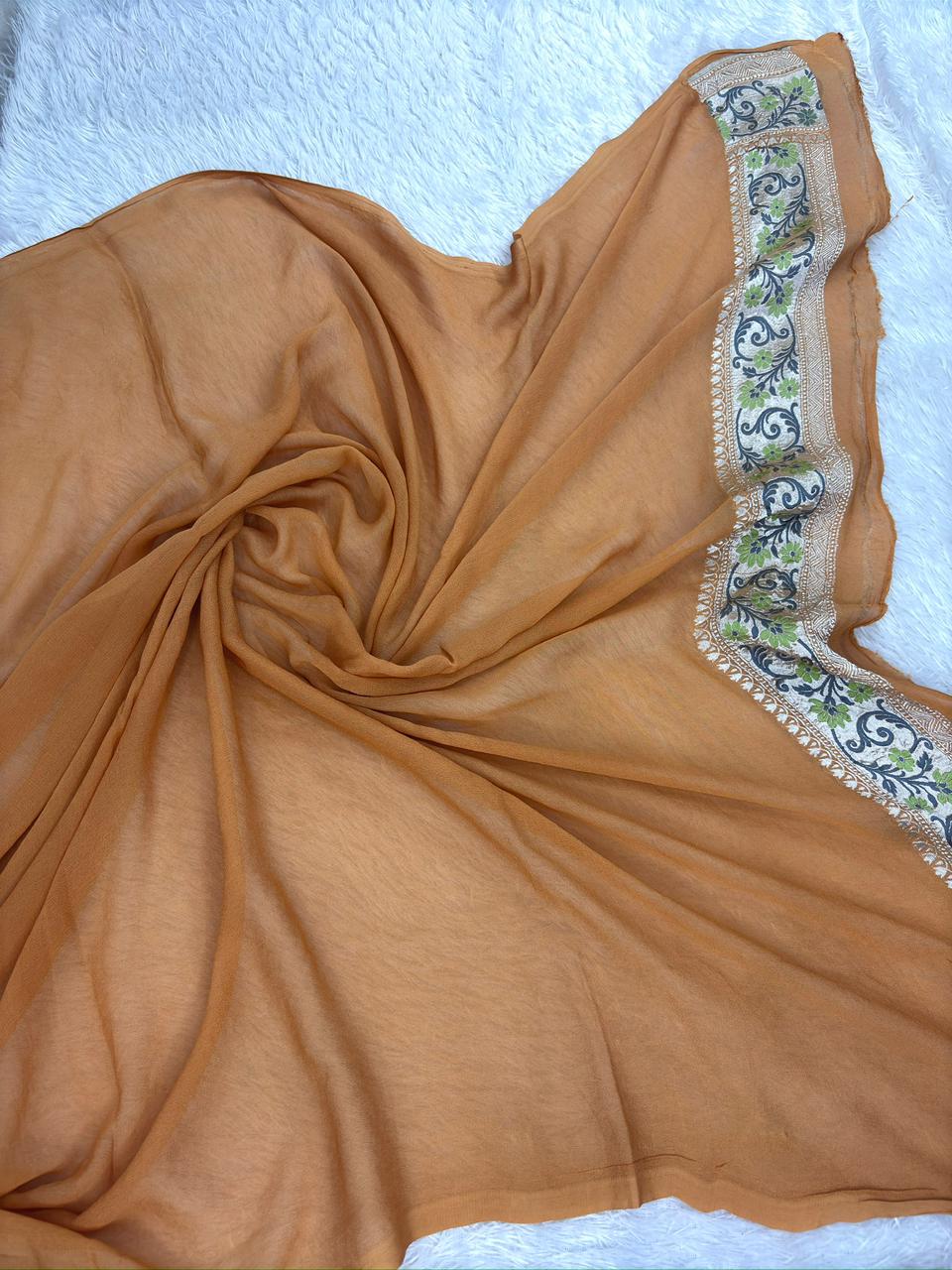 Burnt Orange Khaddi Georgette Silver Zari Meenakari Jaal Handloom Banarasi Saree