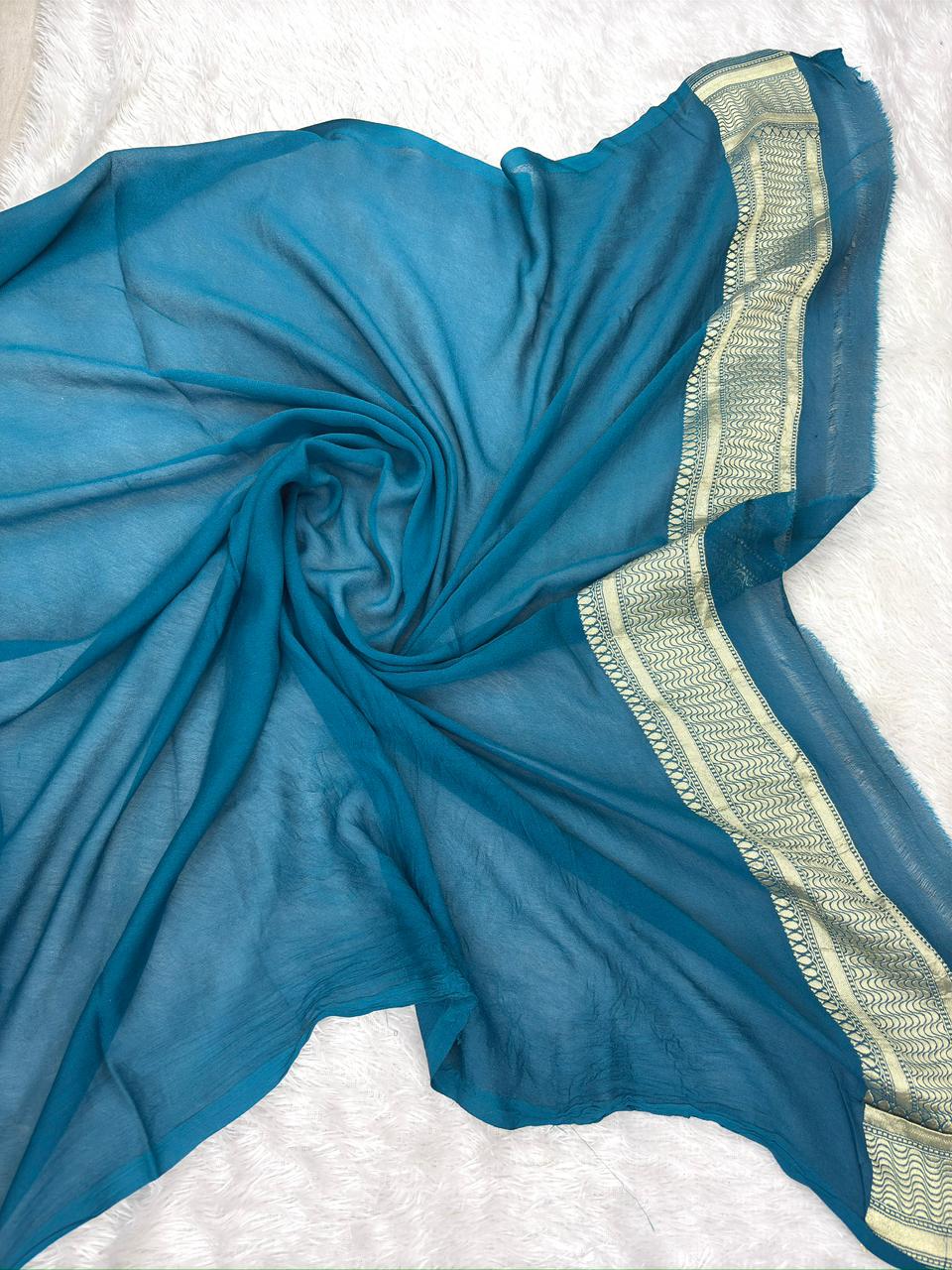 Teal Blue Khaddi Georgette Silver Zari Meenakari Handloom Saree
