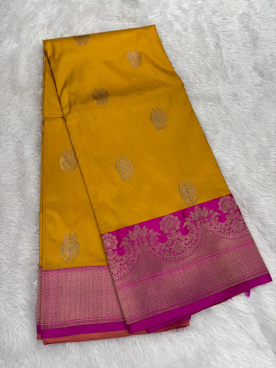 Mustard Yellow Katan Silk Kadhua Boota Handloom Banarasi Saree with Rani Pink Zari Border