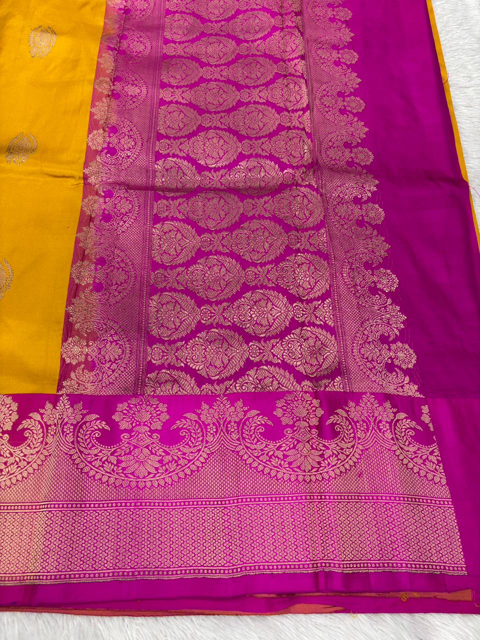 Mustard Yellow Katan Silk Kadhua Boota Handloom Banarasi Saree with Rani Pink Zari Border