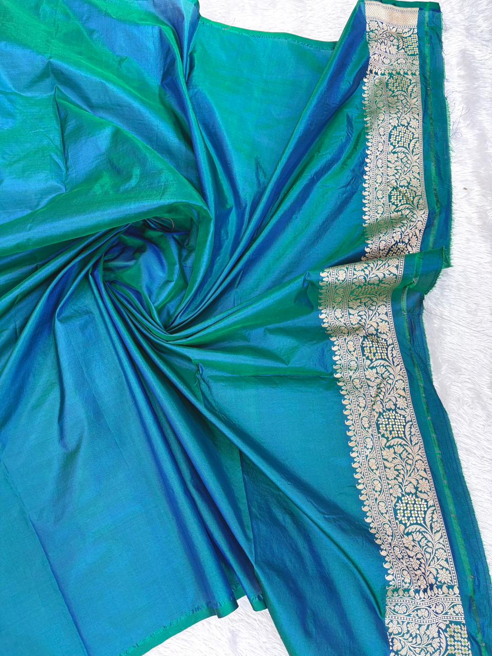Majestic Peacock Teal Katan Silk Banarasi Saree with Meenakari Floral Jaal & Cutwork