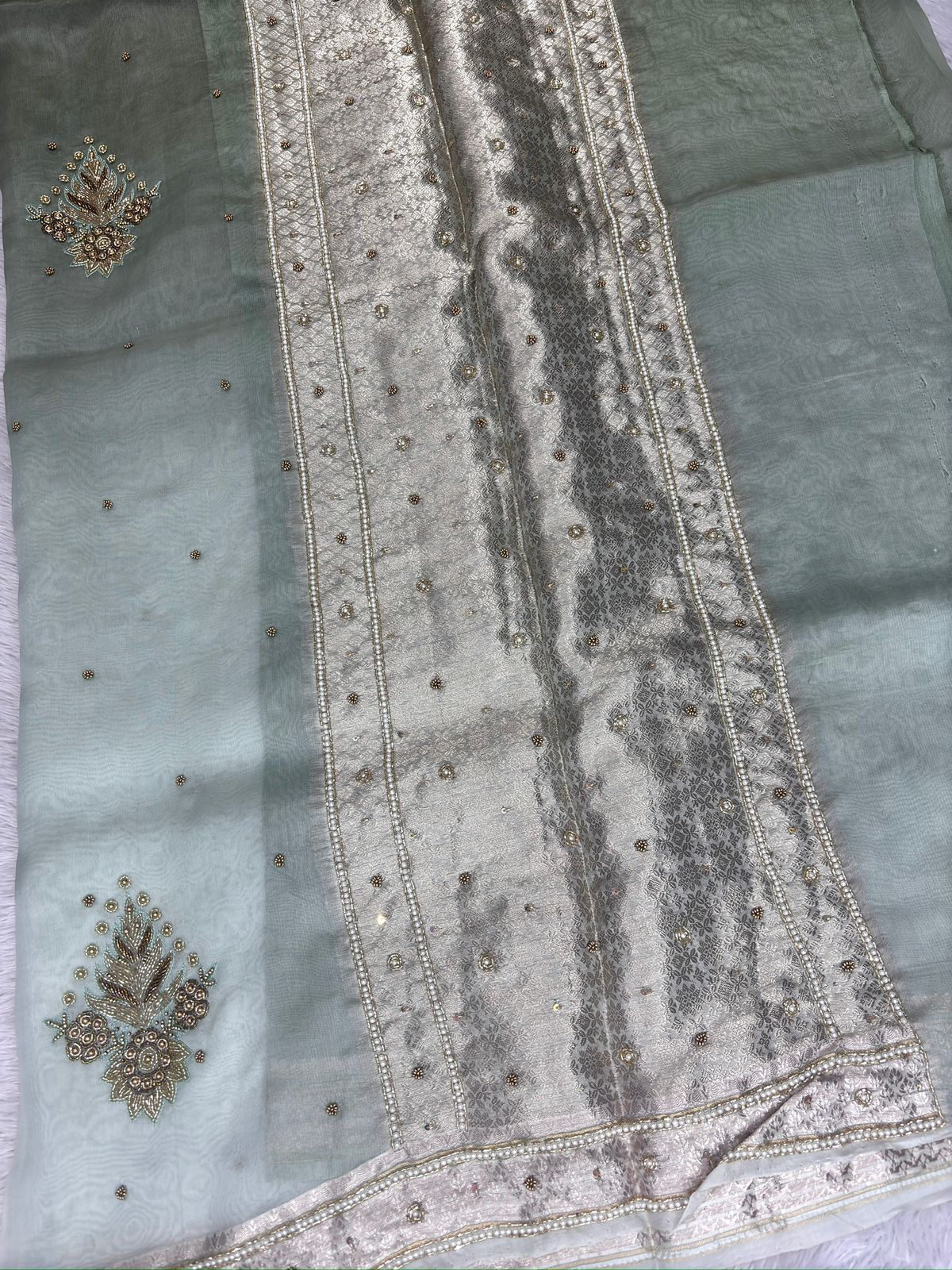 Sage Mist Dual Shade Saree with Antique Silver Zari and Pearl-Encrusted Floral Medallions