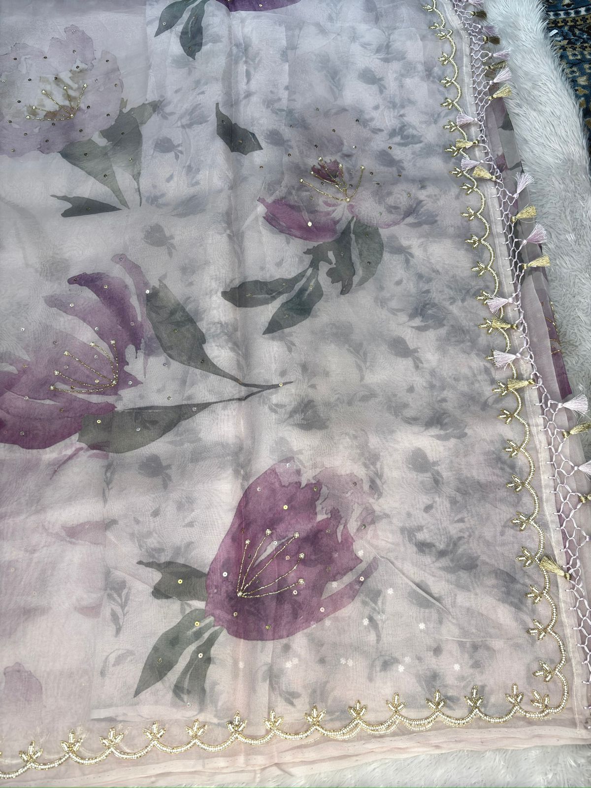 Mauve Serenity: Handloom Saree with Soft Watercolor Florals & Pearl-Infused Zari Scallops