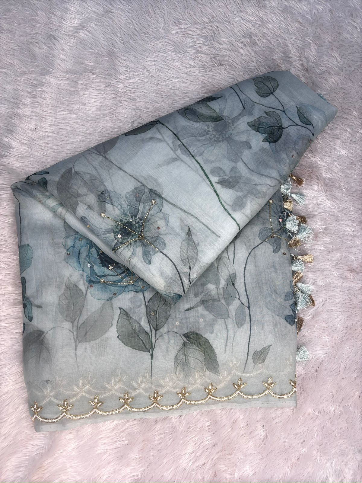 Cerulean Mist: Handloom Saree with Teal Botanical Prints & Hand-Embellished Zari Scallops