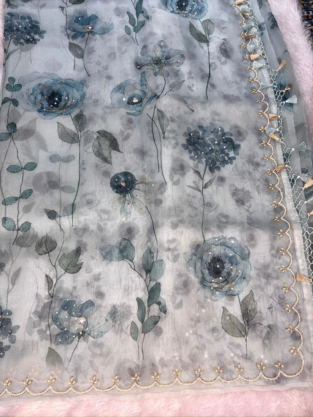 Cerulean Mist: Handloom Saree with Teal Botanical Prints & Hand-Embellished Zari Scallops