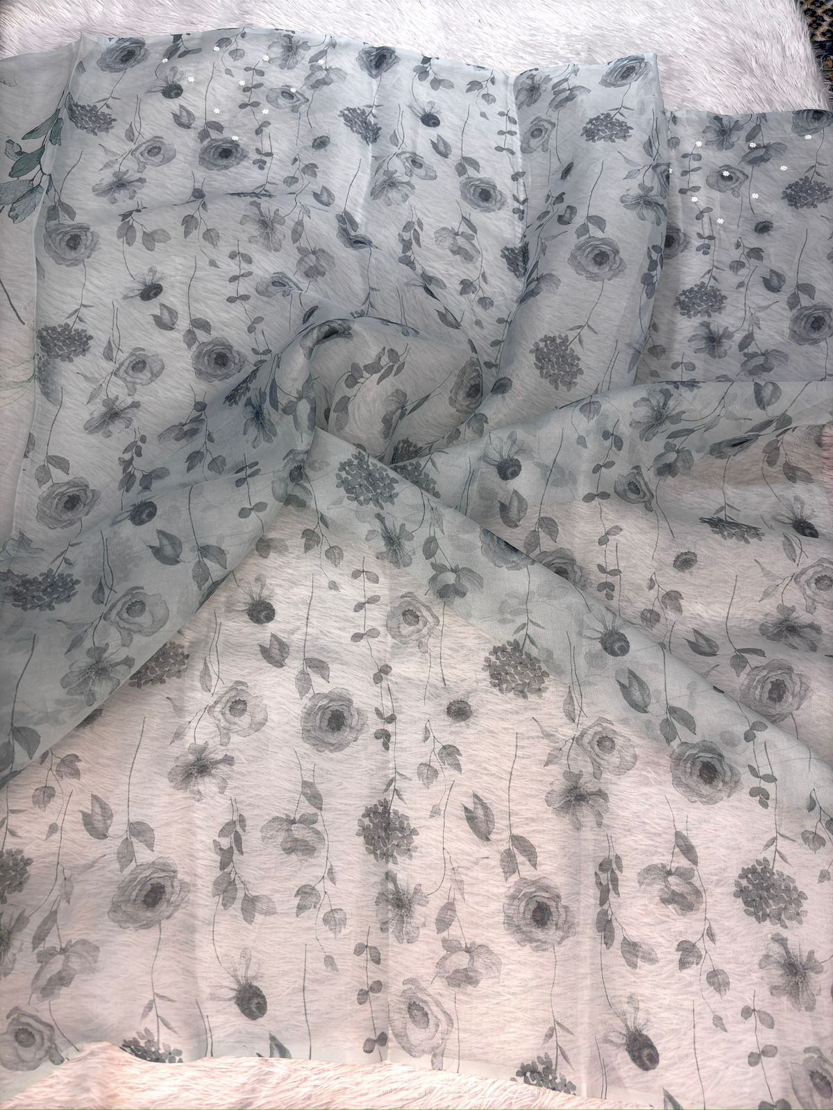 Cerulean Mist: Handloom Saree with Teal Botanical Prints & Hand-Embellished Zari Scallops